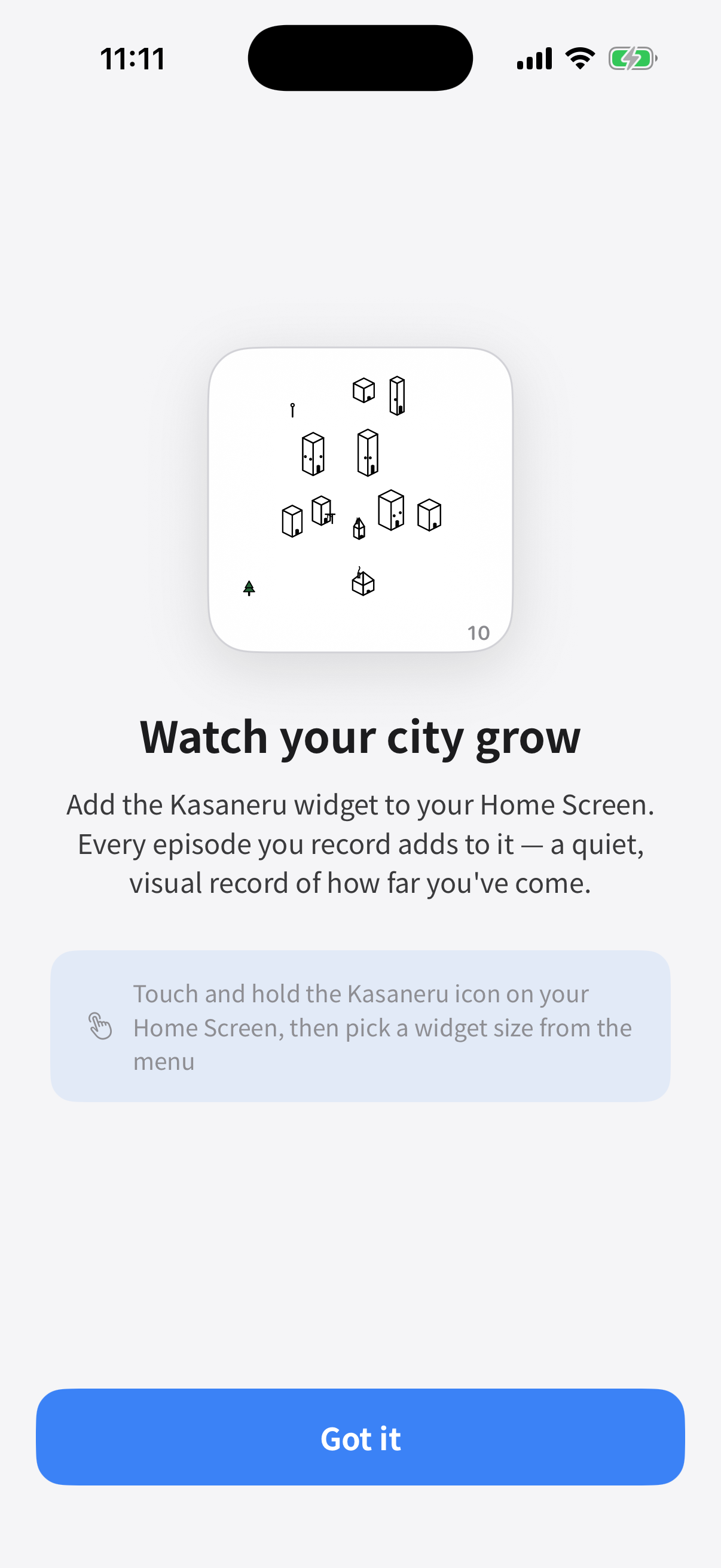 The widget introduction screen, showing a miniature city grown to ten buildings — one for each recorded episode.